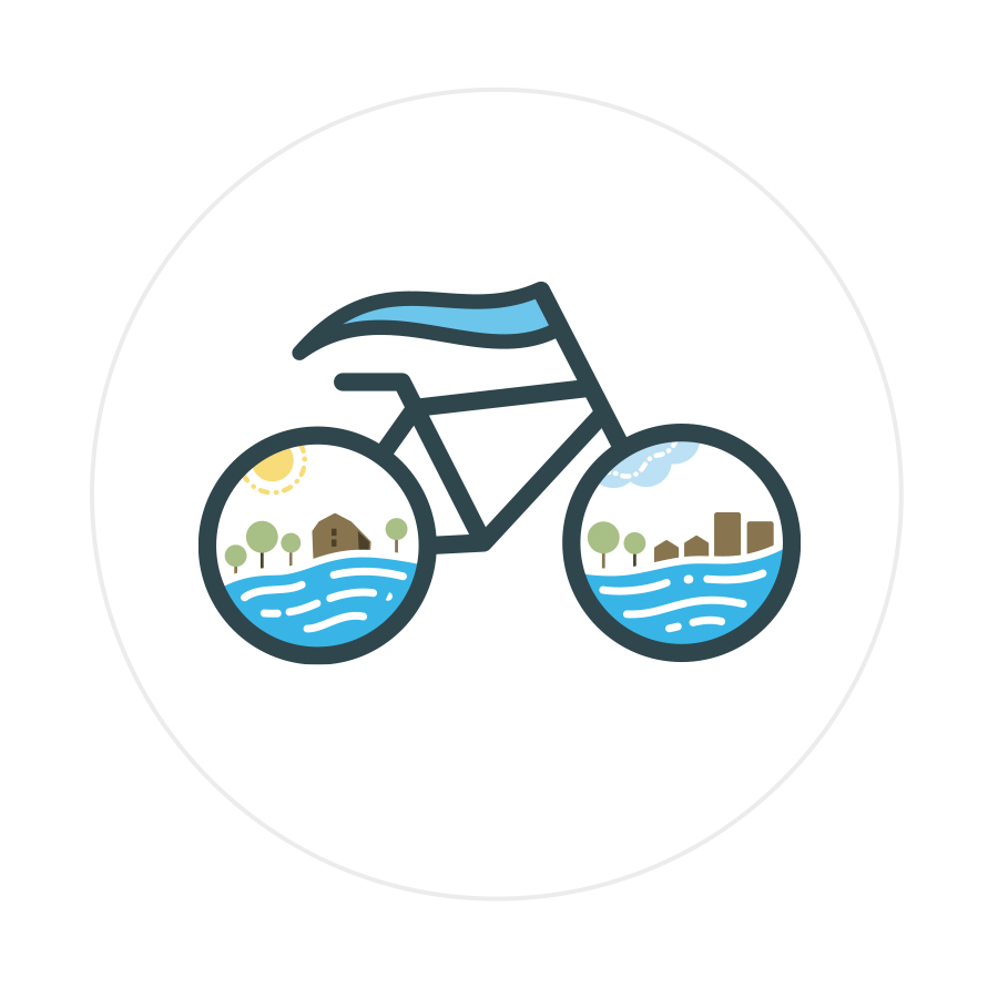 Logo design featuring bicycle with flag flying and scenery hidden in wheels